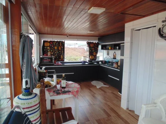 Imagem Casa com 3 dormitórios à venda, 142 m² por R$ 700.000,00 - Maracanã - Praia Grande/SP