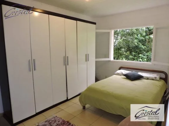 Imagem Casa com 4 dormitórios (1 suíte) à venda, 205 m² - Condomínio Parque das Artes - Embu das Artes/SP
