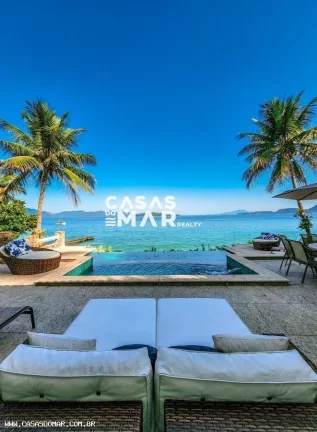 Foto do imóvel Casa Frente Mar para Temporada em Angra dos Reis / RJ no bairro Mombaça
