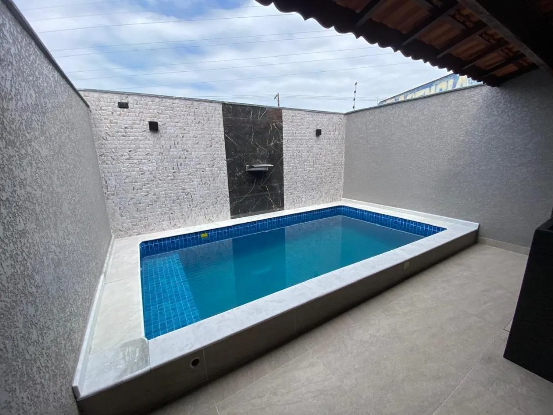 Imagem LINDA CASA NOVA COM PISCINA NO VERDE MAR