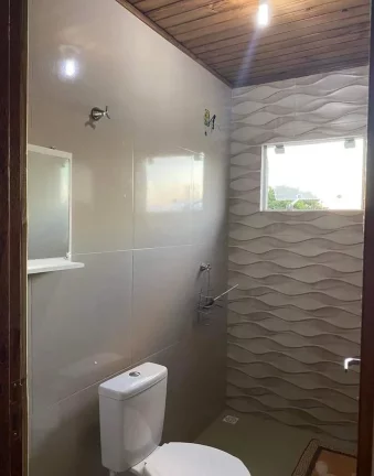 Imagem Casa à venda em Imbituba-SC, Alto Arroio: 4 quartos, 1 suíte, piscina e 150m² - Imperdível!