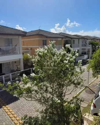 Imagem Excelente casa duplex em condomínio fechado com três suítes e área gourmet a venda em Stella Maris Salvador