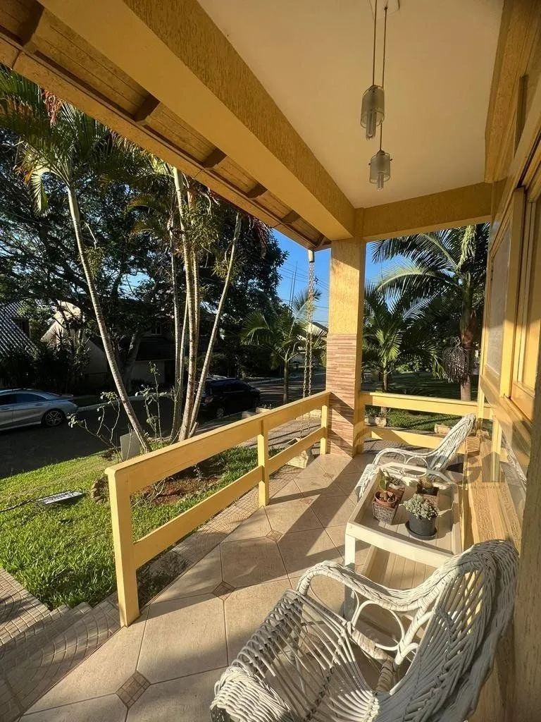 Imagem Casa com 4 quartos, suíte, churrasqueira, vaga de garagem, no bairro Elsa, Viamão/RS