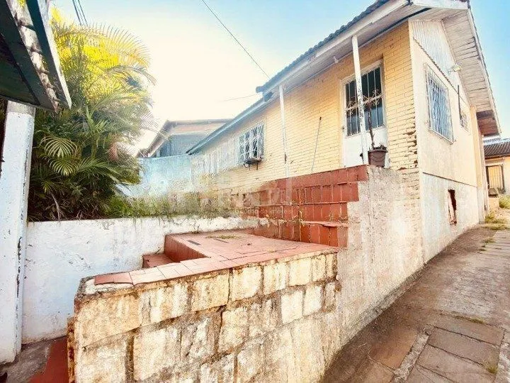 Imagem CASA BAIRRO CAMAQUÃ COM 4 DORMITORIOS