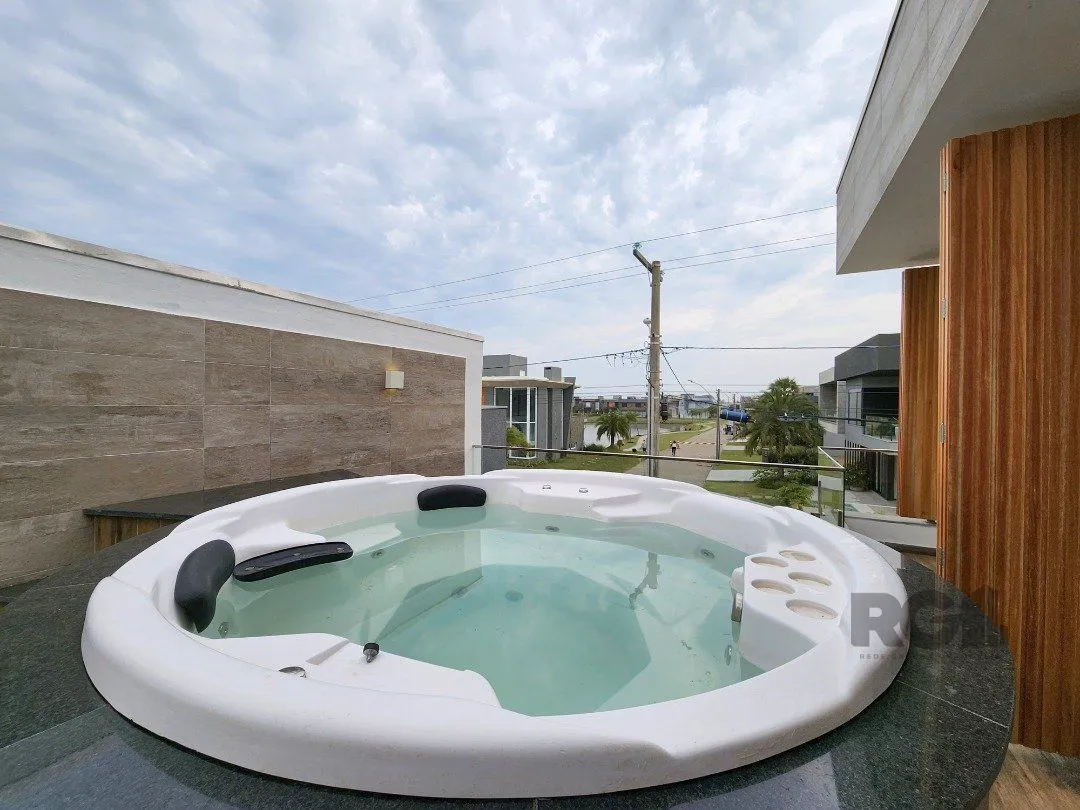 Imagem Casa de Condomínio em Atlântida Sul