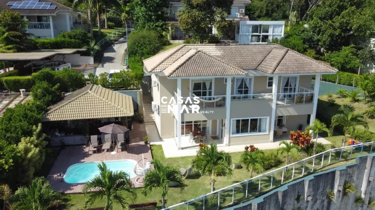 Imagem Casa de Luxo em Condomínio no Recreio dos Bandeirantes - 5 quartos, 5 suítes, 4 salas, 6 banheiros, 5 vagas de garagem - Rio de Janeiro-RJ.