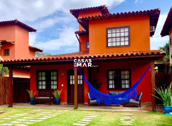 Imagem Excelente Casa em Condomínio, a poucos pasos da praia, Búzios-RJ: 4 Quartos, 3 Suítes, 2 Vagas de Garagem