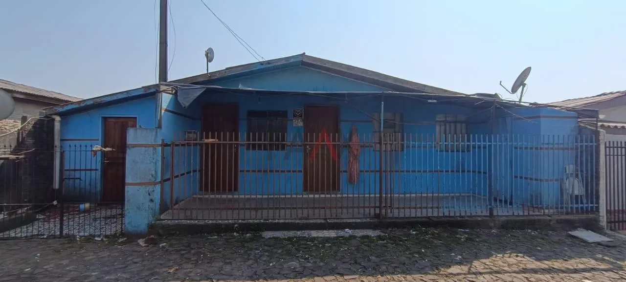 Foto do imóvel Terreno com casa de madeira á venda no Morro Alto em Guarapuava