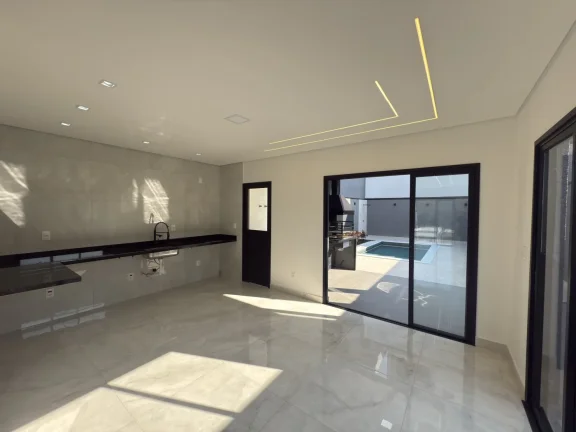 Imagem Casa a venda com 3 suítes, 4 vagas e piscina deslumbrante.