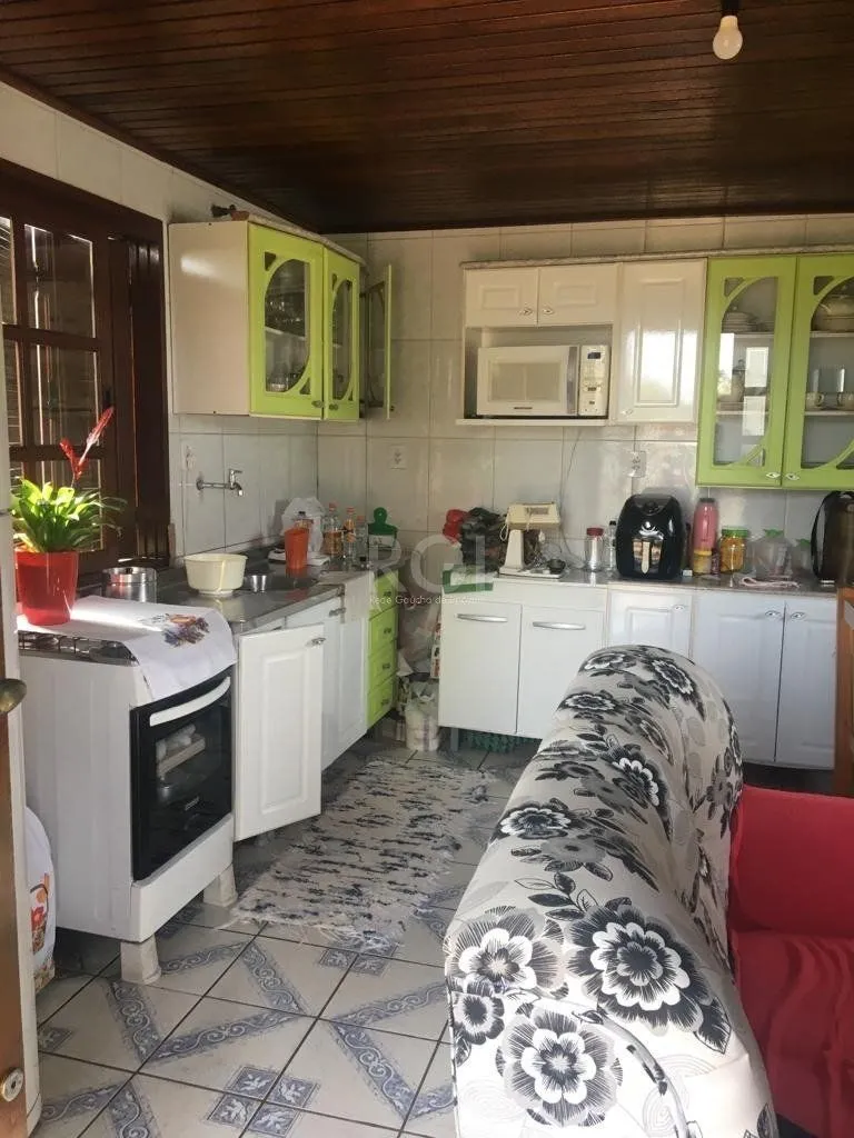 Imagem Sobrado para Venda - 92m², 3 dormitórios, 2 vagas - Restinga Nova