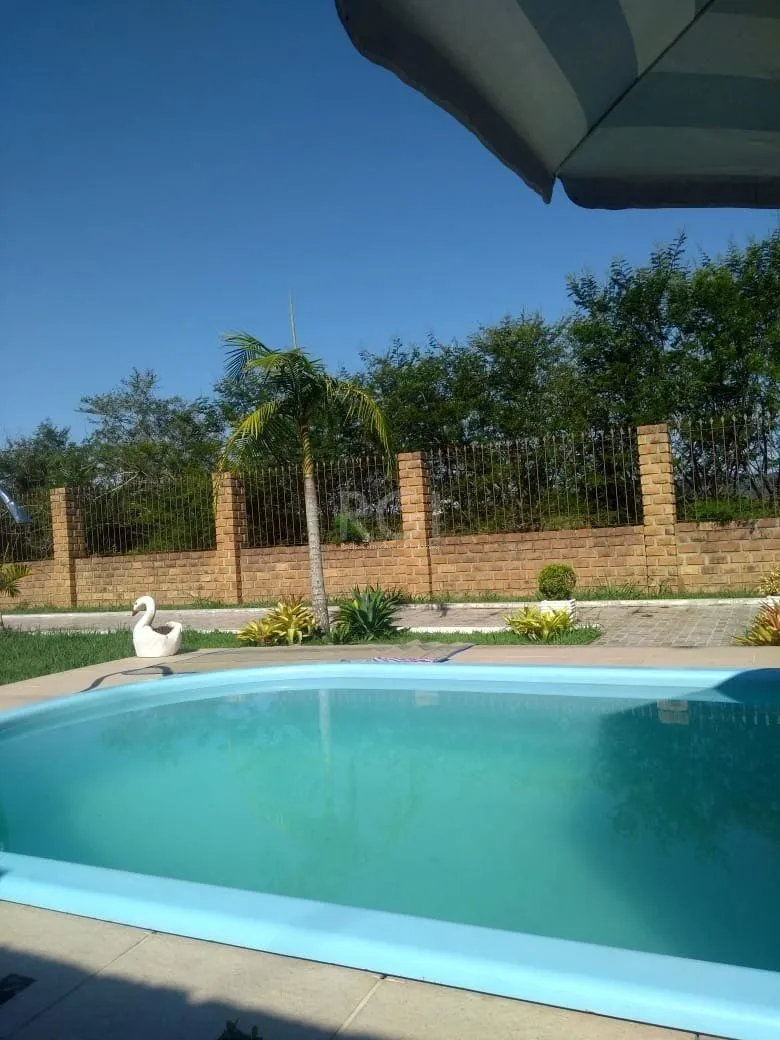 Imagem Casa com Piscina no bairro Lami