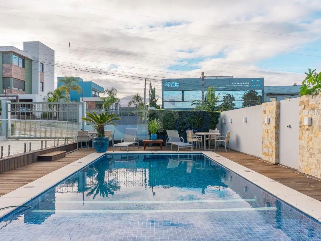 Imagem Casa de Alto Padrao com 4 Dormitorios, Piscina Aquecida e Espaço Gourmet no Centenario, em Torres/RS