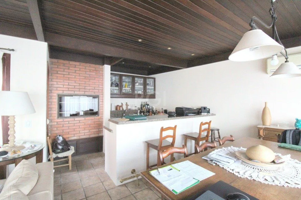 Imagem Casa para Venda - 100m², 3 dormitórios, 3 vagas - Nonoai