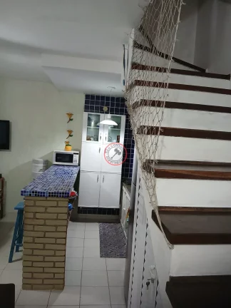 Imagem CASA A VENDA DENTRO DE CONDOMÍNIO EM FRENTE A PRAIA, COM 2 DORMITÓRIOS,VARANDA, JARDIM, CHURRASQUEIRA E 2 VAGAS PARA CARRO