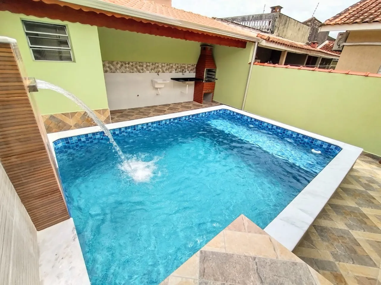 Imagem Casa para Venda em Mongaguá, Itaóca, 2 dormitórios, 1 suíte, 2 banheiros, 2 vagas