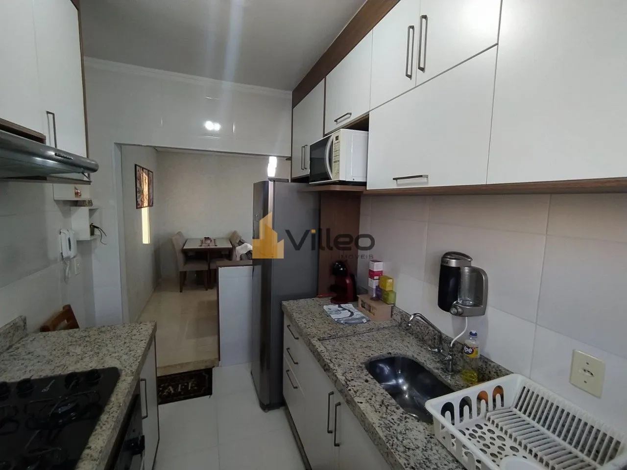 Imagem Descubra um novo padrão de viver no coração do Jardim São Carlos. Este refinado apartamento à v...
