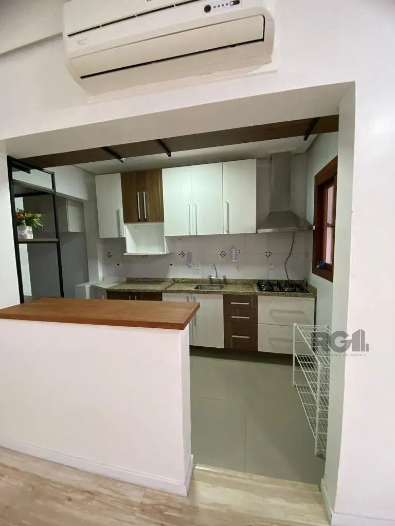 Imagem Casa térrea com 02 dormitórios e 01 vaga, no bairro Aberta dos Morros, em Porto Alegre.