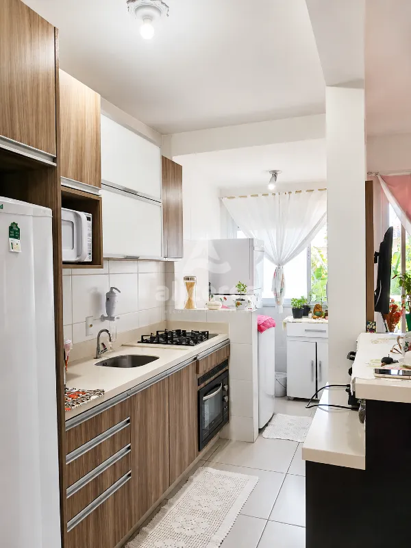 Imagem Apartamento com 2 dormitórios, suíte e churrasqueira na sacada em Areias - São José/SC