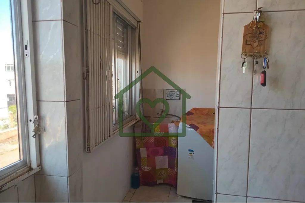 Imagem Descubra o seu novo lar no coração de Porto Alegre, no bairro Camaquã! Este encantador apartament...