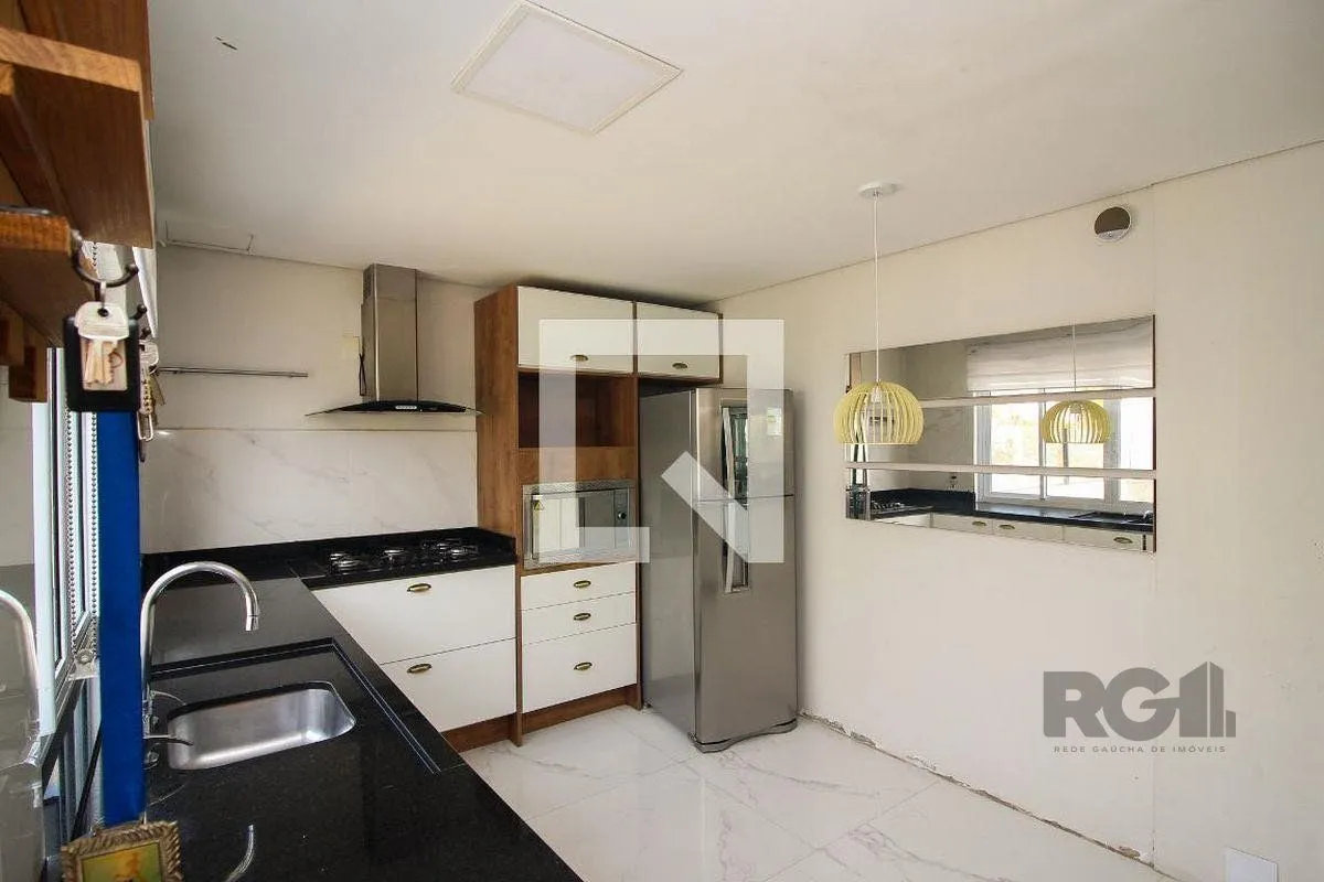 Imagem Casa 4 dormitórios à venda Partenon Porto Alegre/RS