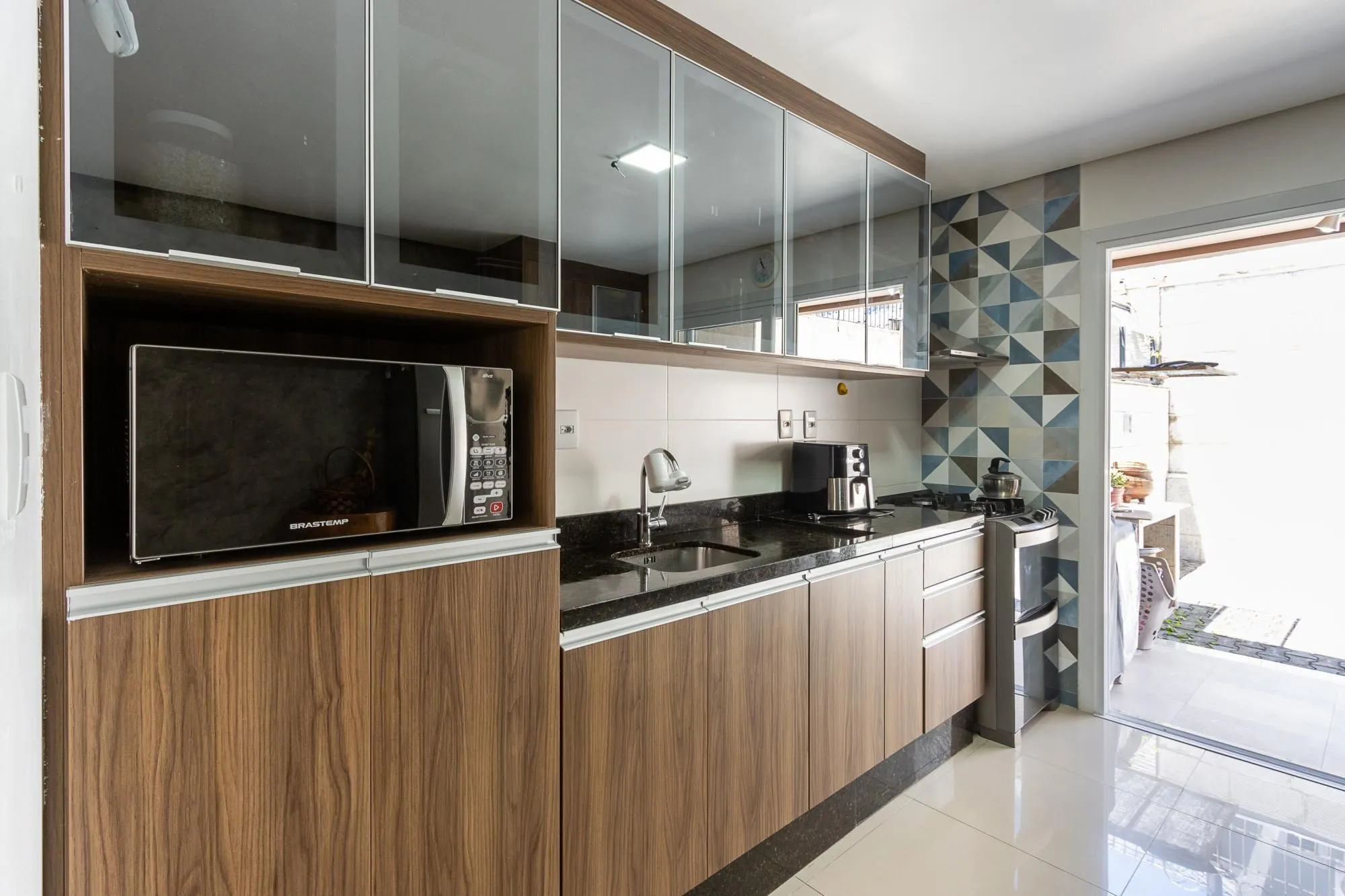 Imagem Sobrado com 2 suites e 2 vagas de garagem - Bairro Guarujá