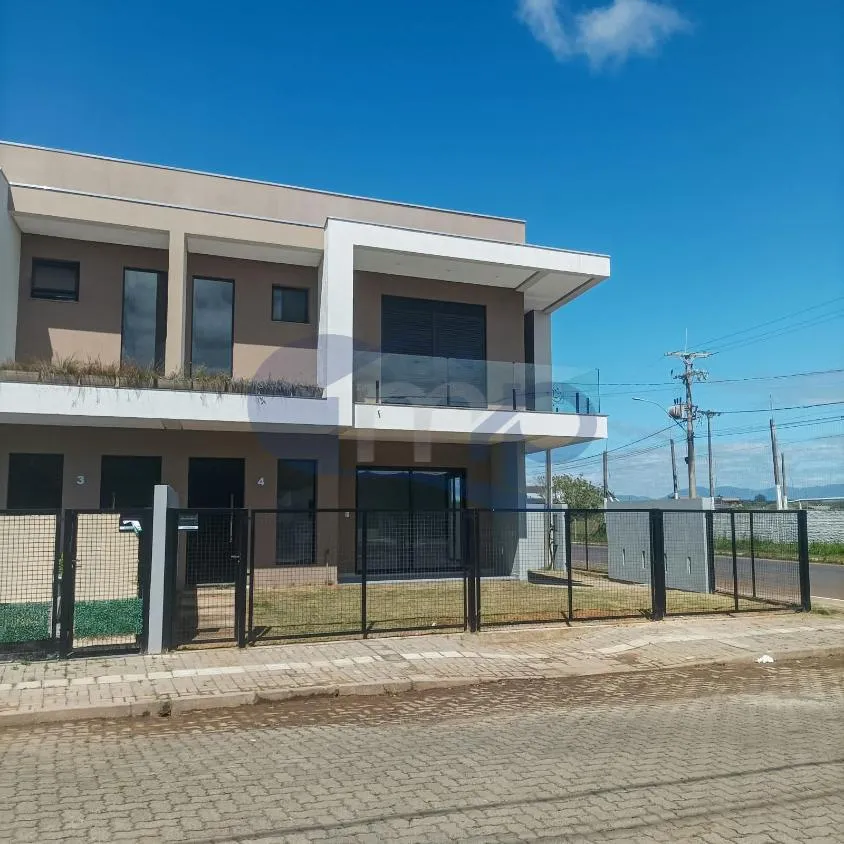 Imagem Sobrado de 3 dormitorios com suite e 2 vagas a venda na Morada das Palmeiras em Torres