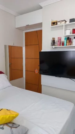 Imagem Apartamento com 2 dormitórios à venda, 56 m² por R$ 360.000 - Caiçara - Praia Grande/SP