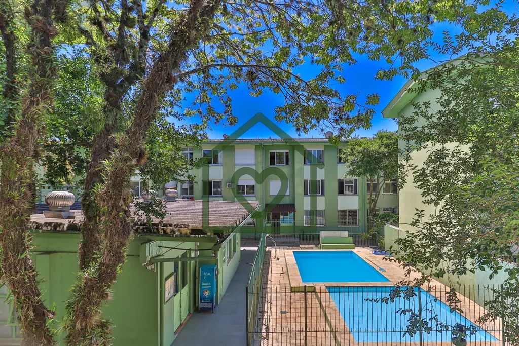 Imagem Apartamento no bairro Camaquã com 61m2 privativos, localizado a um lance de escada, composto por do...