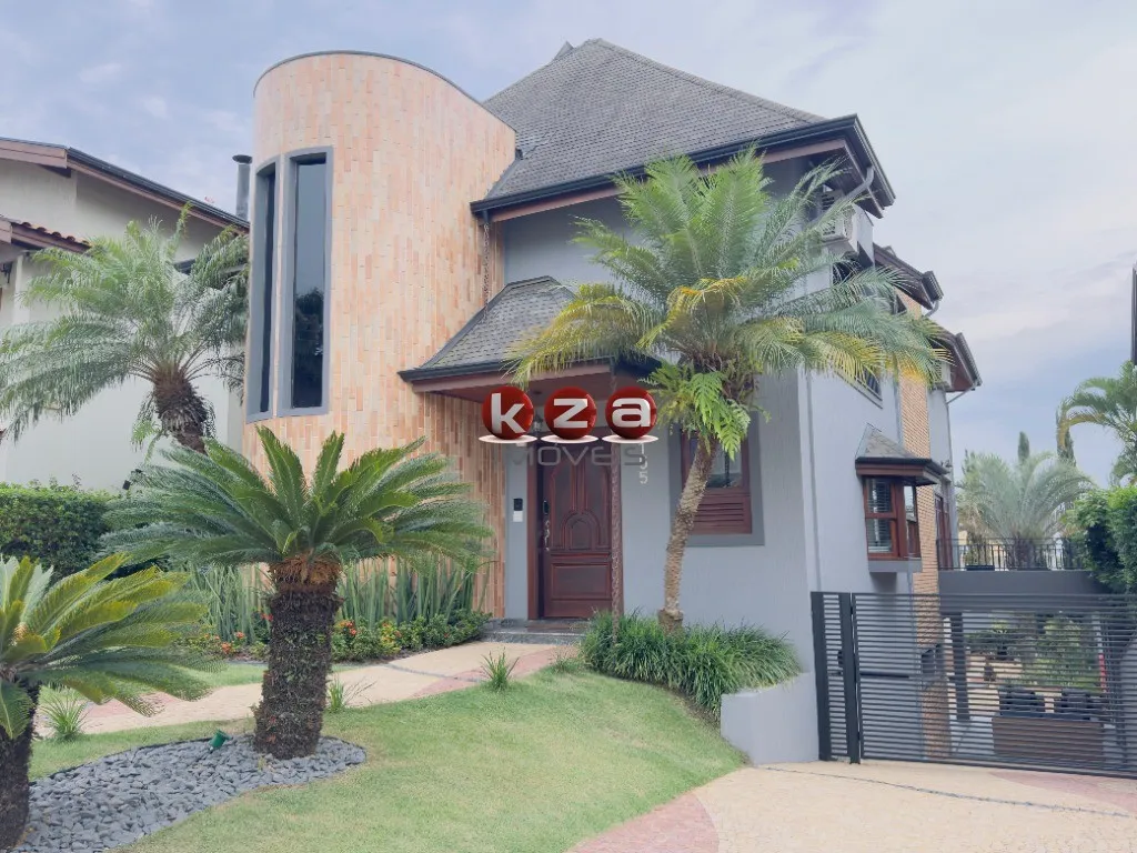 Imagem Casa de luxo a venda no Condomínio Reserva Colonial em Valinhos: 3 suítes + 1, 4 salas e amplo espaço gourmet com piscina.