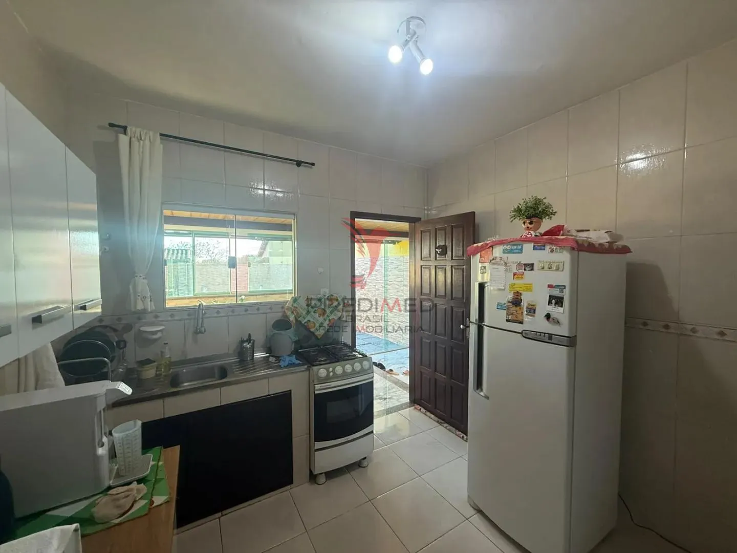 Imagem CASA À VENDA COM PISCINA - R$ 400.000