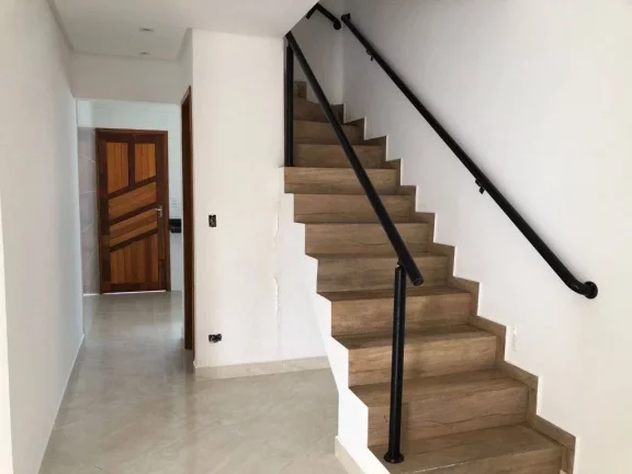 Imagem Sobrado com 2 dormitórios à venda, 60 m² por R$ 390.000,00 - Caiçara - Praia Grande/SP