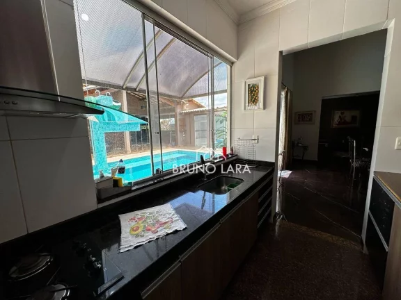 Imagem Casa à venda em Mário Campos Condomínio Serra dos Bandeirantes.