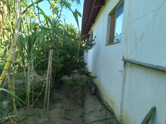 Imagem Chácara em Guarapari com casa linear pomar garagem com 1.300 m2 de terreno e área construída de 117m2.
