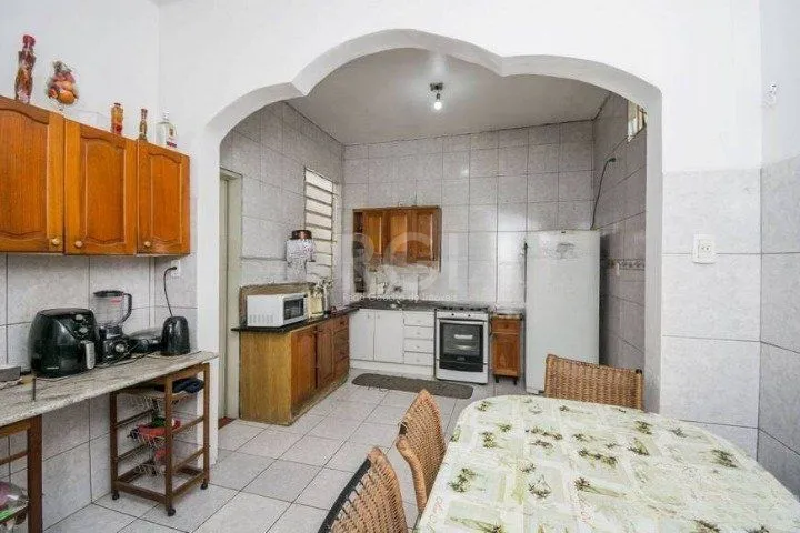 Imagem Casa para Venda - 290m², 3 dormitórios, 4 vagas - Santo Antonio
