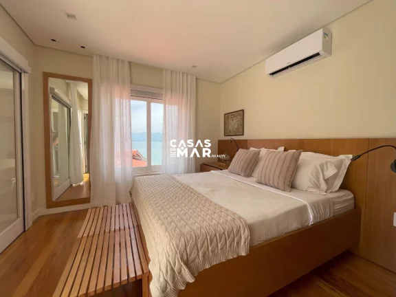 Imagem Casa de Luxo à Beira-Mar em Condomínio na Vila Velha, Angra dos Reis-RJ: 6 Quartos, 6 Suítes, 7 Salas e 7 Banheiros.