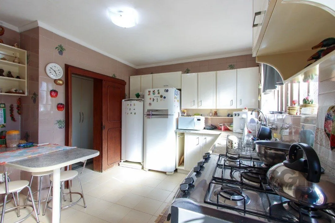 Imagem Casa a venda com 03 dormitórios, living 03 ambientes com vista para o Rio.