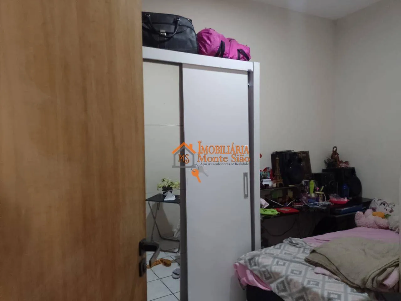 Imagem Casa com 3 dormitórios à venda, 125 m² por R$ 290.000,00 - Conjunto Residencial Haroldo Veloso - Guarulhos/SP