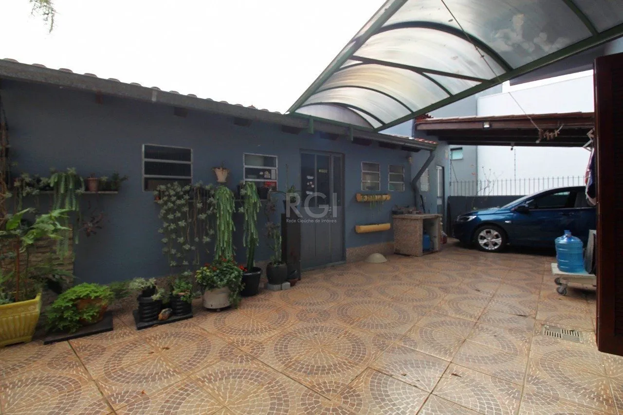 Imagem Casa para Venda - 339m², 3 dormitórios, 2 vagas - Vila Nova, Porto Alegre