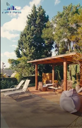 Imagem CASA TÉRREA ESTILO NORMANDO, 4 SUÍTES, TERRENO 1.107m², COND. NA GRANJA