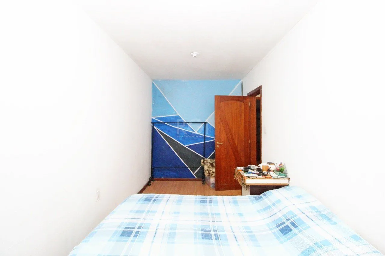 Imagem Casa 5 dormitórios, 1 suíte, 2 vagas de garagem, no bairro Camaquã, Poa/RS.
