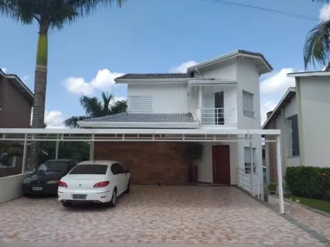Imagem VENDA DE CASA NO CONDOMÍNIO ARUJÁ COUNTRY CLUB, EM ARUJÁ/SP, 380m² com 3 suítes, área gourmet com churrasqueira, cinema e 4 vagas. CONSULTE-NOS.