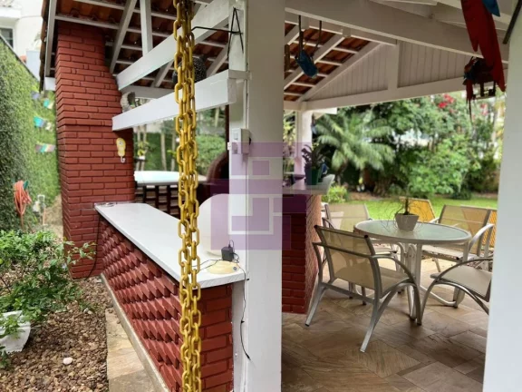 Imagem Casa à Venda no Condomínio Residencial Park Lane – 3 Suítes e Jardim com Árvores Frutíferas