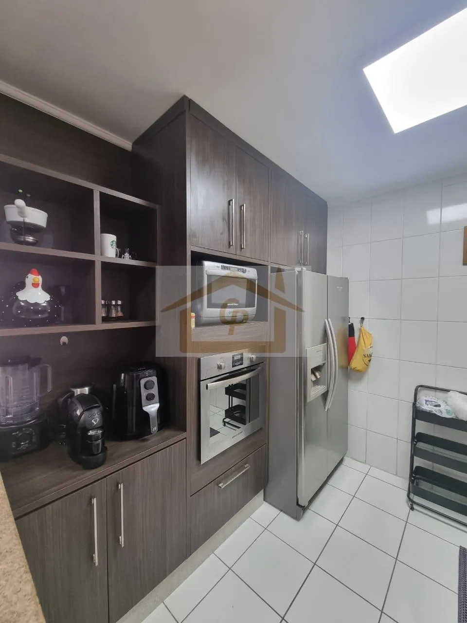 Imagem Bela área Gourmet 3 quartos sendo um suíte, forno de pizza, fogão e churrasqueira, 2 vagas