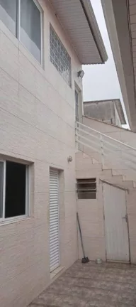Imagem Casa com 2 dormitórios à venda por R$ 650.000 - Ocian - Praia Grande/SP