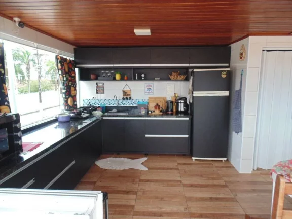 Imagem Casa com 3 dormitórios à venda, 142 m² por R$ 700.000,00 - Maracanã - Praia Grande/SP