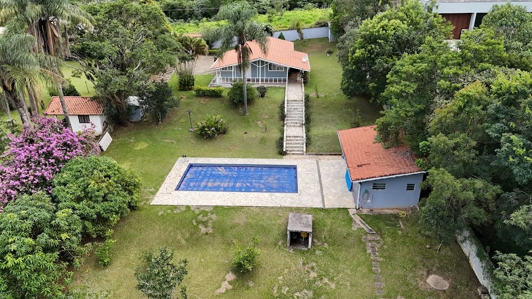 Imagem Belíssima Casa no Condomínio Porta do Sol com piscina e casa de hóspedes