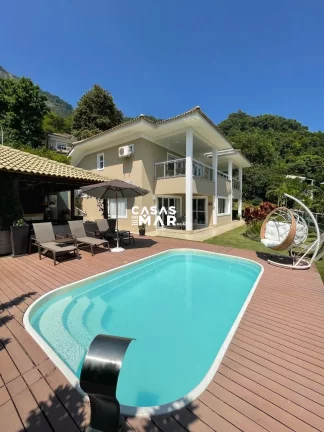 Imagem Casa de Luxo em Condomínio no Recreio dos Bandeirantes - 5 quartos, 5 suítes, 4 salas, 6 banheiros, 5 vagas de garagem - Rio de Janeiro-RJ.