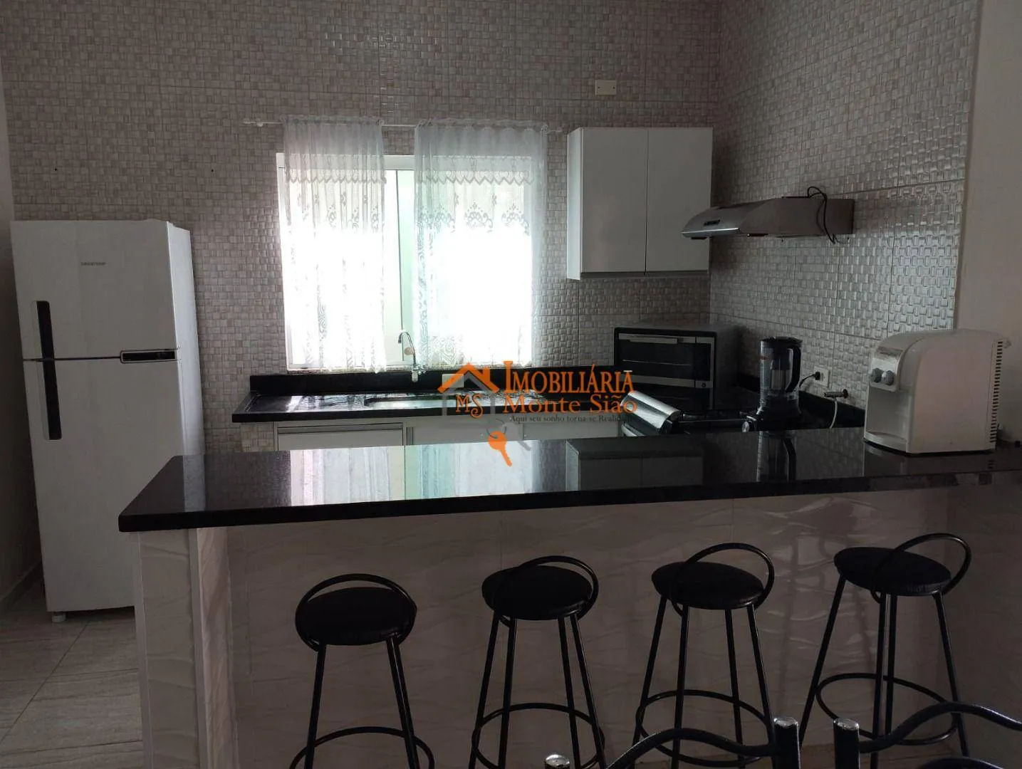 Imagem Sobrado com 3 dormitórios à venda, 220 m² por R$ 680.000,00 - Vila Caputera - Mogi das Cruzes/SP