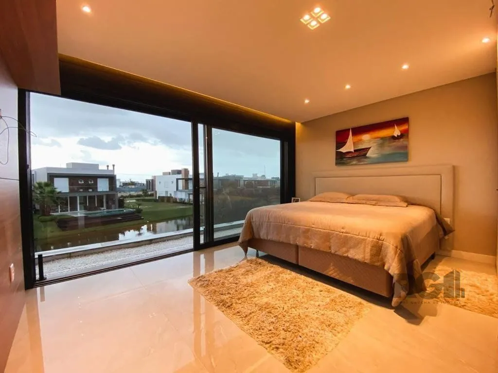 Imagem Casa de Condomínio em Atlântida Sul