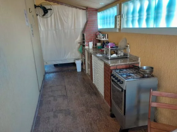 Imagem Casa com 2 dormitórios à venda, 49 m² por R$ 460.000 - Ocian - Praia Grande/SP